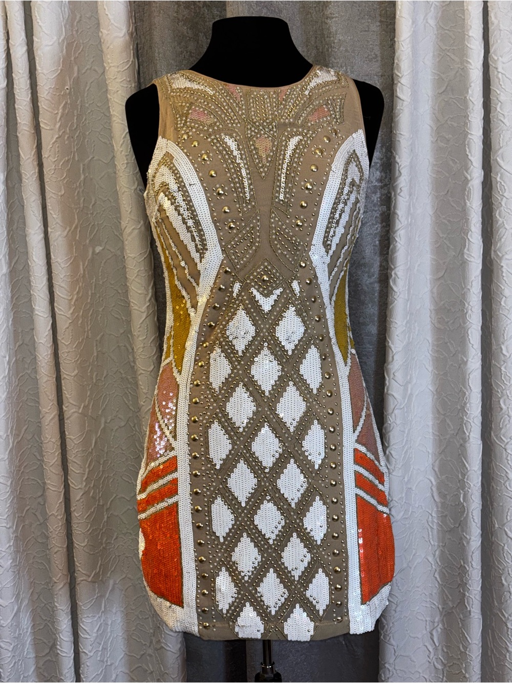 Looks great on petite curvy figures!  Embellished Beaded Mini Dress